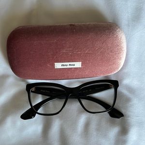 Black MiuMiu stardust optical frame